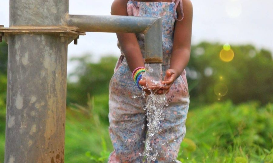 girl-washing-her-hands-at-a-water-well-in-burkina-faso-africa-e1659542851666.jpg girl-washing-her-hands-at-a-water-well-in-burkina-faso-africa-e1659542851666.jpg
